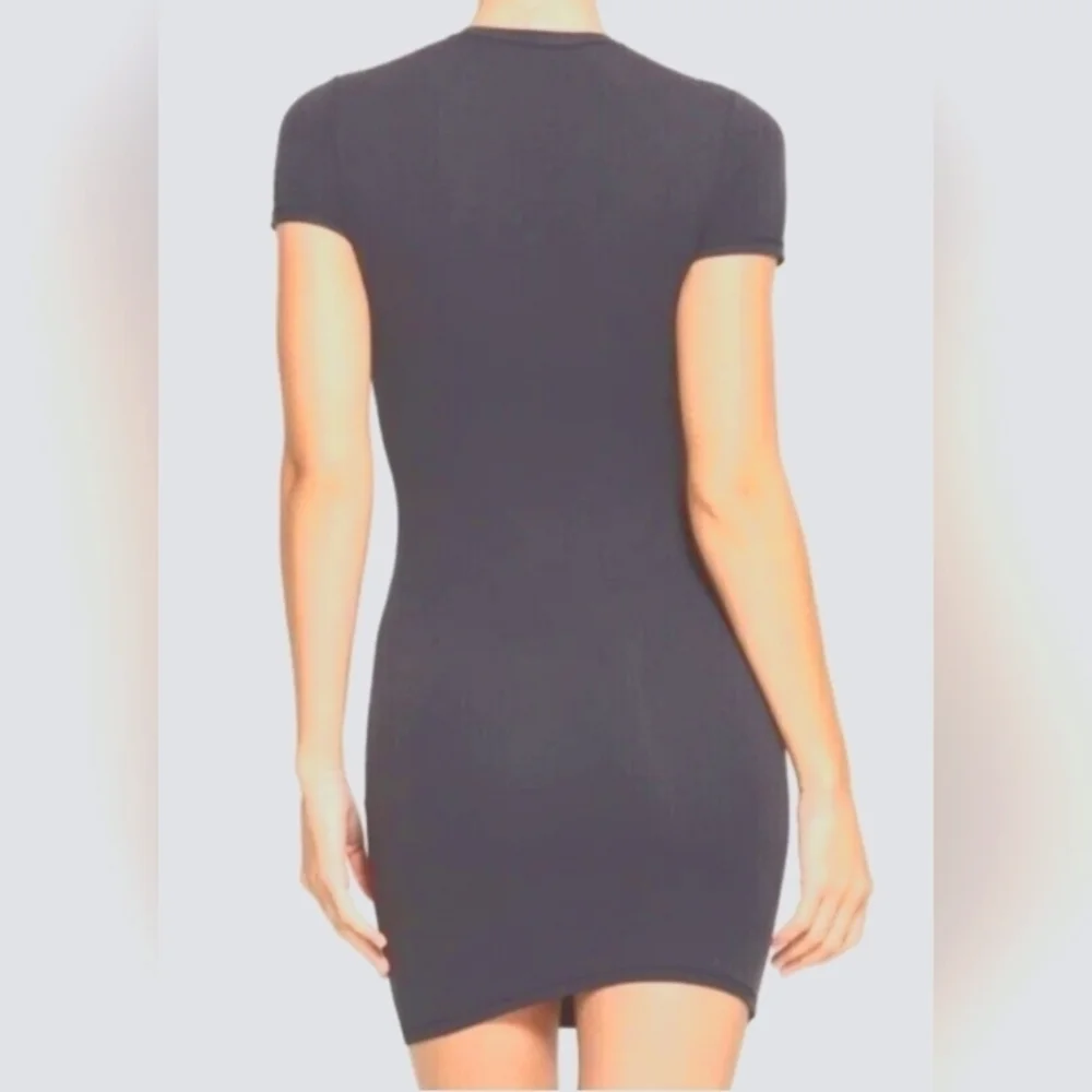 Skims recycled swim dress.